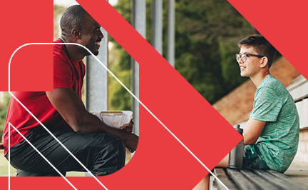 ACE Youth Fitness Specialist talking to a young client after an outdoors fitness training session